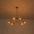 Load image into Gallery viewer, Farmhouze Light - Brass 6 - Light Amber Glass Globe Linear Sputnik Chandelier - Chandelier - Brass -