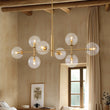 Load image into Gallery viewer, Farmhouze Light - Mid - Century Sputnik Clear Glass Globe Linear Island Chandelier - Chandelier - Brass -