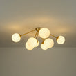 Load image into Gallery viewer, Brass 8-Light Milky Glass Globe Sunburst Semi Flush Mount
