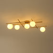 Load image into Gallery viewer, Brass 5-Light Linear Opal Glass Globe Sputnik Semi Flush
