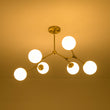 Load image into Gallery viewer, Modern 6-Light Brass Frosted Glass Globe Branched Chandelier
