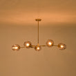 Load image into Gallery viewer, Sculptural 5-Light Gray Tinted Glass Globe Branch Island Pendant
