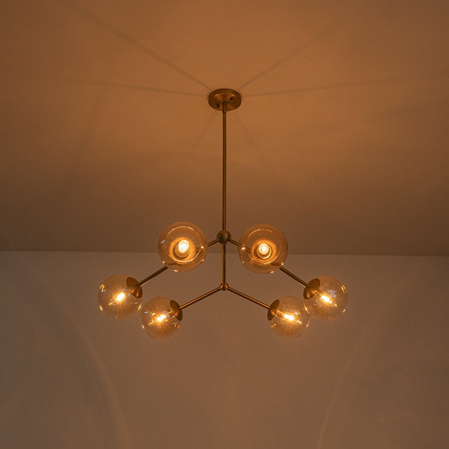 Farmhouze Light - Brass 6 - Light Amber Glass Globe Linear Sputnik Chandelier - Chandelier - Brass - 