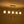 Load image into Gallery viewer, Farmhouze Light - Farmhouse Linear Candle Style White Fabric Brass Island Chandelier - Chandelier - 5 Bulbs - 
